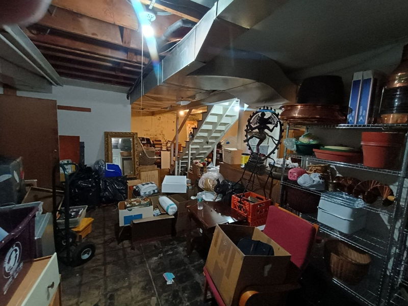 Cluttered Basement Full of Mixed Estate Items