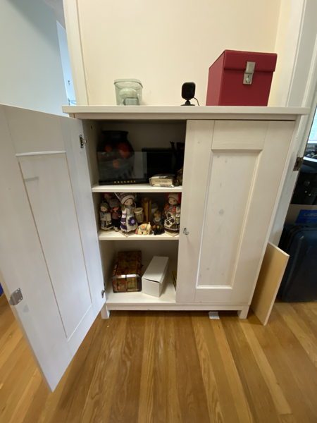 White Wood Cabinet with Collectibles Collection